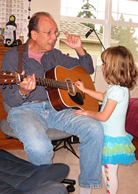 Bernie teaching guitar